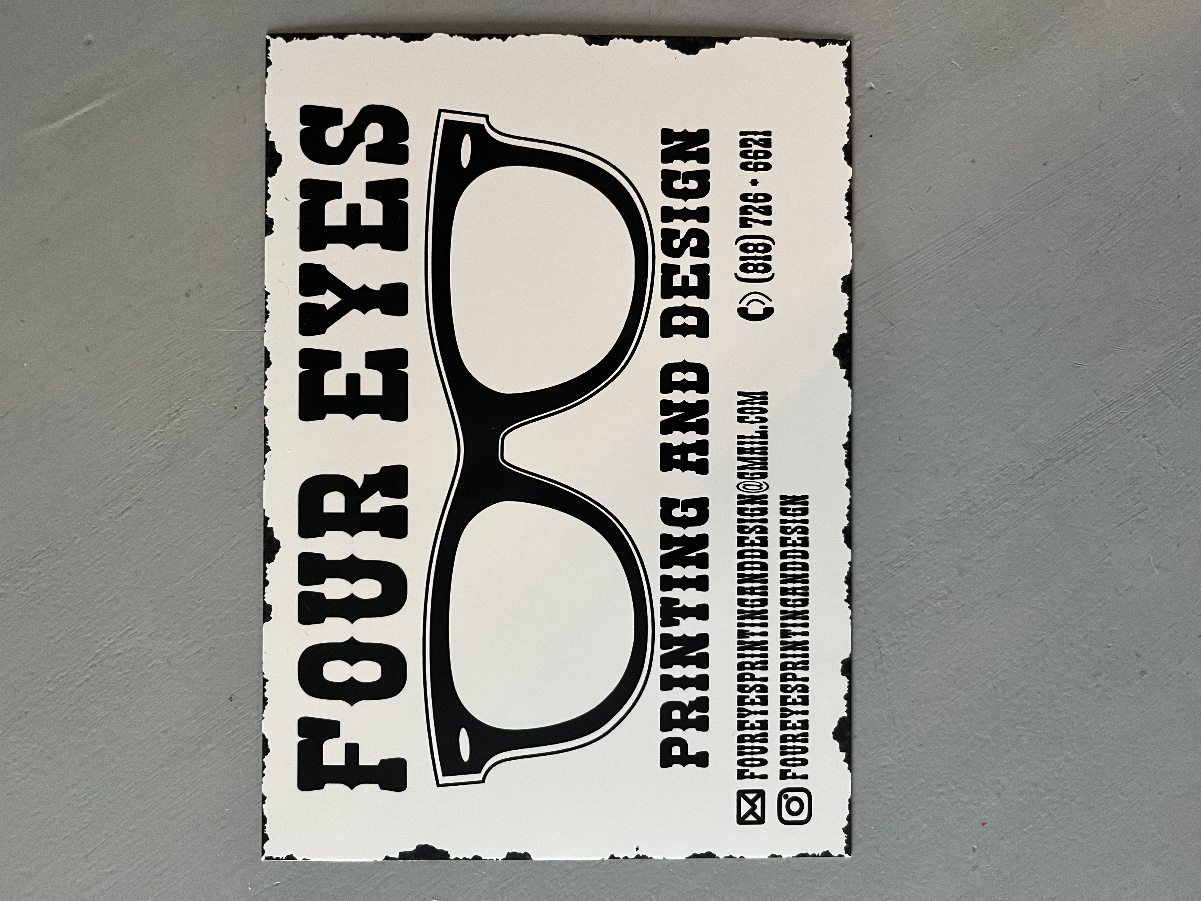 Four Eyes Printing and Design logo